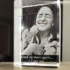 Rectangular photo crystal featuring a woman playing with her dog, with "Until we meet again... I love you" engraved at the bottom